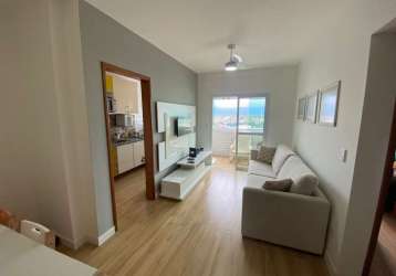 Apartamento com 2 dormitórios para alugar, 62 m² por r$ 2.800,02/mês - vila guilhermina - praia grande/sp