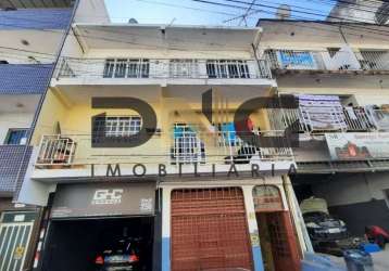 Predio com apartamentos e lojas, terreno escritura, qe 40.