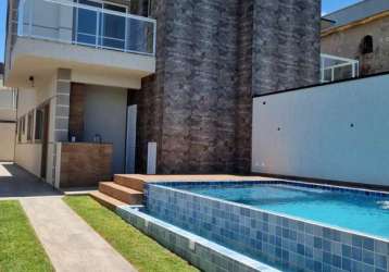 Casa em condomínio fechado com 3 quartos à venda na governador mario covas junior, 4980, jardim regina, itanhaém, 101 m2 por r$ 649.000