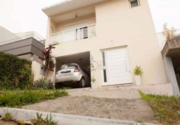 Casa em condomínio fechado com 3 quartos à venda na rua adriano pereira da silva, 290, vila nova, porto alegre por r$ 799.000