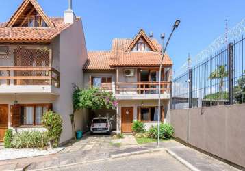 Casa em condomínio fechado com 3 quartos à venda na avenida orleaes, 105, guarujá, porto alegre por r$ 549.000