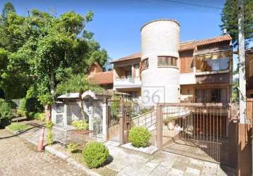 Casa com 3 quartos à venda na travessa pedra redonda, 377, jardim isabel, porto alegre por r$ 1.300.000