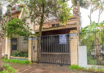 Casa com 3 quartos à venda na travessa nossa senhora de lourdes, 257, tristeza, porto alegre por r$ 1.200.000