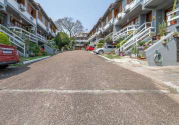 Casa em condomínio fechado com 3 quartos à venda na rua general rondon, 1259, tristeza, porto alegre por r$ 890.000