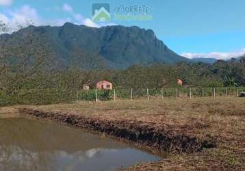 Terreno plano 5.120 metros em morretes na ponte alta  já com lago e todo cercado  com tela e portão