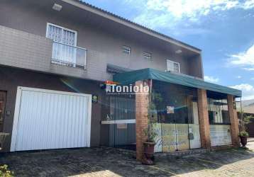 Sobrado e loja residencial e comercial