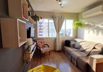 Vende-se apartamento com 3 dormitórios, living estendido 2 ambientes, banheiro social, ,cozinha americana, churrasqueira, área de serviço independente e 2 vagas de garagem. condomínio com elevador, ,p