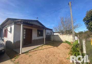 Casa à venda no bairro lami | imóvel com 2 dormitórios no bairro lami, com segunda casa nos fundos com mais 3 dormitórios, vaga de garagem, sala, cozinha, a poucos metros do asfalto na avenida princip