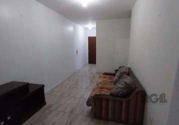 Apartamento terreo, com 1 dormitório, pátio amplo e coberto, living dois ambientes bem definidos, cozinha ampla e 1 banheiro.&lt;br&gt;prédio localizado junto a orla do guaíba e cais embarcadeiro. jun