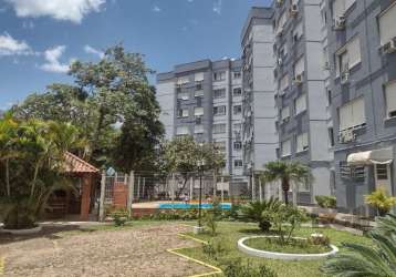 Ótimo apartamento com 62m², bem iluminado e areado, andar alto, com 02 dormitórios,  living, cozinha com área de serviço e banheiro social. prédio com portaria, elevador, piscina, salão de festas, pla