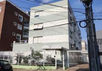 Apartamento à venda em porto alegre, localizado na rua líbero badaró. possui 2 quartos, 2 banheiros, cozinha e área de serviço. o edifício está em bom estado de conservação e conta com porteiro eletrô