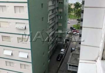 Apartamento em são vicente com dois dormitórios, sala para dois ambientes , cozinha e vaga.