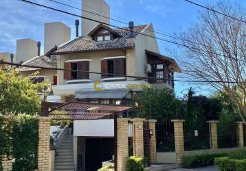 Casa em condomínio fechado com 4 quartos à venda na rua padre joão batista reus, 438, vila conceição, porto alegre por r$ 1.490.000