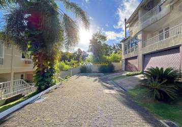 Casa em condomínio fechado com 3 quartos à venda na avenida coronel marcos, 39, pedra redonda, porto alegre por r$ 1.200.000