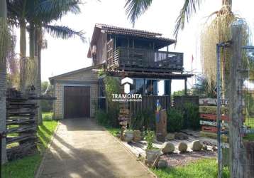 Esta encantadora casa está disponível para venda no tranquilo bairro morro agudo em araranguá. sc