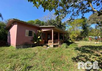 Sítio para compra em porto alegre/rs | imóvel localizado no loteamento parque são paulo, conta com casa principal, casa para caseiro, galpão de serviço, horta e árvores frutíferas e nativas. venha con