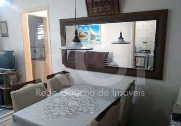 Apartamento de 2 dormitórios. predial vende apartamento com 53,67 m² no bairro azenha em porto alegre . são 02 dormitórios, com living, cozinha, área de serviço e banheiro social com ventilação direta