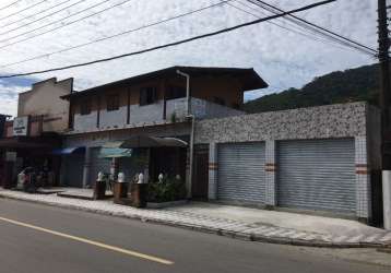 Galpão / depósito / armazém para venda em boiçucanga de 350.00m² com 4 garagens