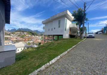 Terreno em condomínio fechado à venda na rua joão queiroz, tijuca, teresópolis, 250 m2 por r$ 240.000