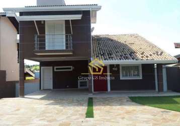 Casa com 4 dormitórios à venda, 300 m² por r$ 1.550.000,00 - condomínio residencial terras do caribe - valinhos/sp