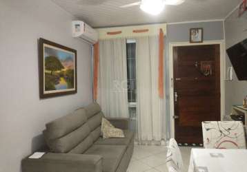 Apartamento 2 dormitórios, no bairro camaquã, porto alegre/rs   &lt;br&gt; &lt;br&gt;&lt;br&gt;excelente  apartamento  com 2 dormitórios, sala,  cozinha e lavanderia independente. todo mobiliado, refo