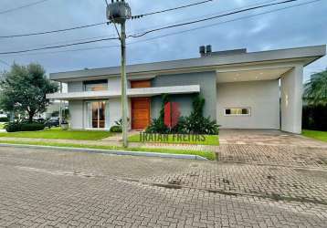 Casa com 4 dormitórios à venda por r$ 2.990.000 - centro - xangri-lá/rs