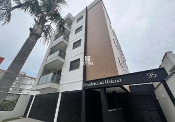 Apartamento com 2 dormitórios, suíte e garagem no residencial helena