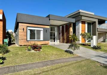 Casa em condomínio fechado com 4 quartos à venda na estrada do mar, 33, parque antártica, capão da canoa, 192 m2 por r$ 1.890.000