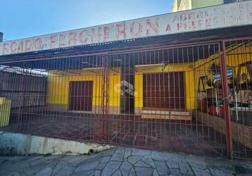 Loja e casa comercial localizada na rua orfanatrófio.