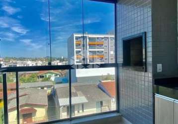 Apartamento com elevador suite e 02 quartos em camobi santa maria