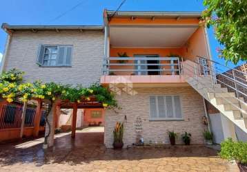 Casa com 2 dormitórios,  rio branco em canoas.