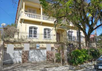 Casa com 4 dormitórios no bairro centro em canoas