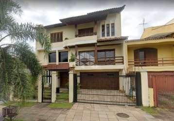 Casa à venda com 4 suítes,  4 vagas de garagem,  no bairro jardim planalto - porto alegre/rs