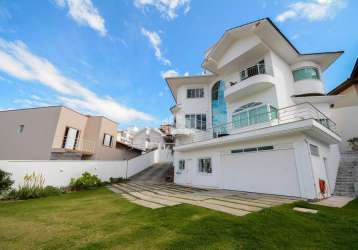 Casa residencial mobiliada com 4 suítes, sendo 2 suítes master com closet a venda - carvoeira, florianópolis sc