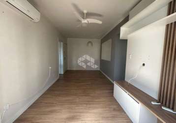 Apartamento de 2 dormitórios com uma vaga para carro