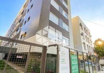 Apartamento dois dormitórios, garagem e elevador, edificio novo