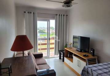 Excelente apartamento amplo mobiliado de 1 dormitório com sacada aberta, sol norte e localização privilegiada no bairro passo d'areia