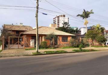 Excelente casa térrea  centro de tramandai- rs 1.900.000 comercial ou residencial com 2 apartamentos