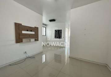 Apartamento semi mobiliado de 2 dormitorios e 1 vaga no portão