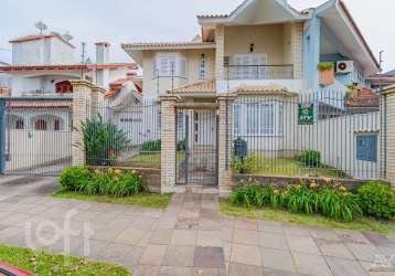 Casa com 4 quartos à venda na avenida doutor sezefredo azambuja vieira, 162, marechal rondon, canoas por r$ 2.100.000