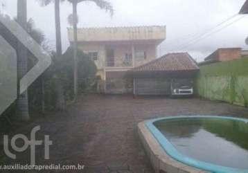 Casa em condomínio fechado com 4 quartos à venda na rua santos dumont, 567, niterói, canoas por r$ 650.000