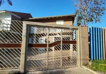 Casa em condomínio fechado com 3 quartos à venda na avenida edgar pires de castro, 5806, restinga, porto alegre por r$ 700.000