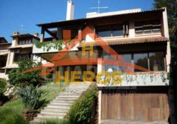 Casa em condomínio fechado com 4 quartos à venda na rua carlos júlio becker, 295, tristeza, porto alegre por r$ 3.000.000