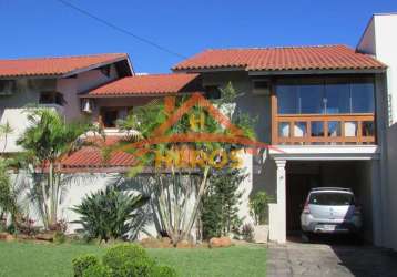 Casa em condomínio fechado com 3 quartos à venda na avenida eduardo prado, 2050, cavalhada, porto alegre por r$ 850.000