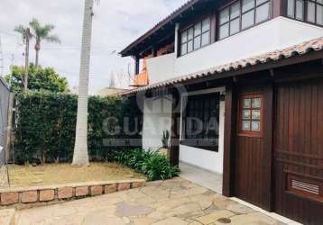 Casa com 3 quartos à venda na rua mampituba, 246, ipanema, porto alegre por r$ 638.000