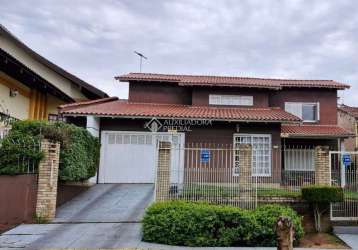 Casa com 4 quartos à venda na rua waldemar guido vicentini, 364, dom feliciano, gravataí, 266 m2 por r$ 950.000