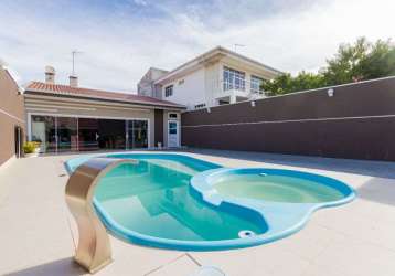 Casa térrea com piscina, 3 dormitórios sendo 1 suíte à venda, 267 m² por r$ 1.150.000 - bairro alto - curitiba/pr