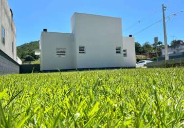 Terreno em condomínio fechado à venda na rua homero de miranda gomes, 1411, fundos, biguaçu, 150 m2