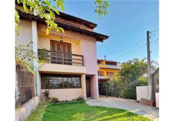 Casa com 3 quartos à venda na avenida emílio schlabitz neto, 139, morro santana, porto alegre por r$ 659.000