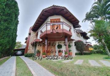 Casa com 4 quartos à venda na rua das trutas, 180, jurerê internacional, florianópolis, 687 m2 por r$ 7.300.000